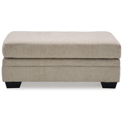 Stonemeade Ottoman - Taupe / Nutmeg